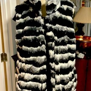 Medium black, white and gray fur vest